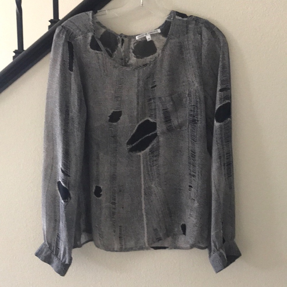 Beautiful sheer blouse with a pocket